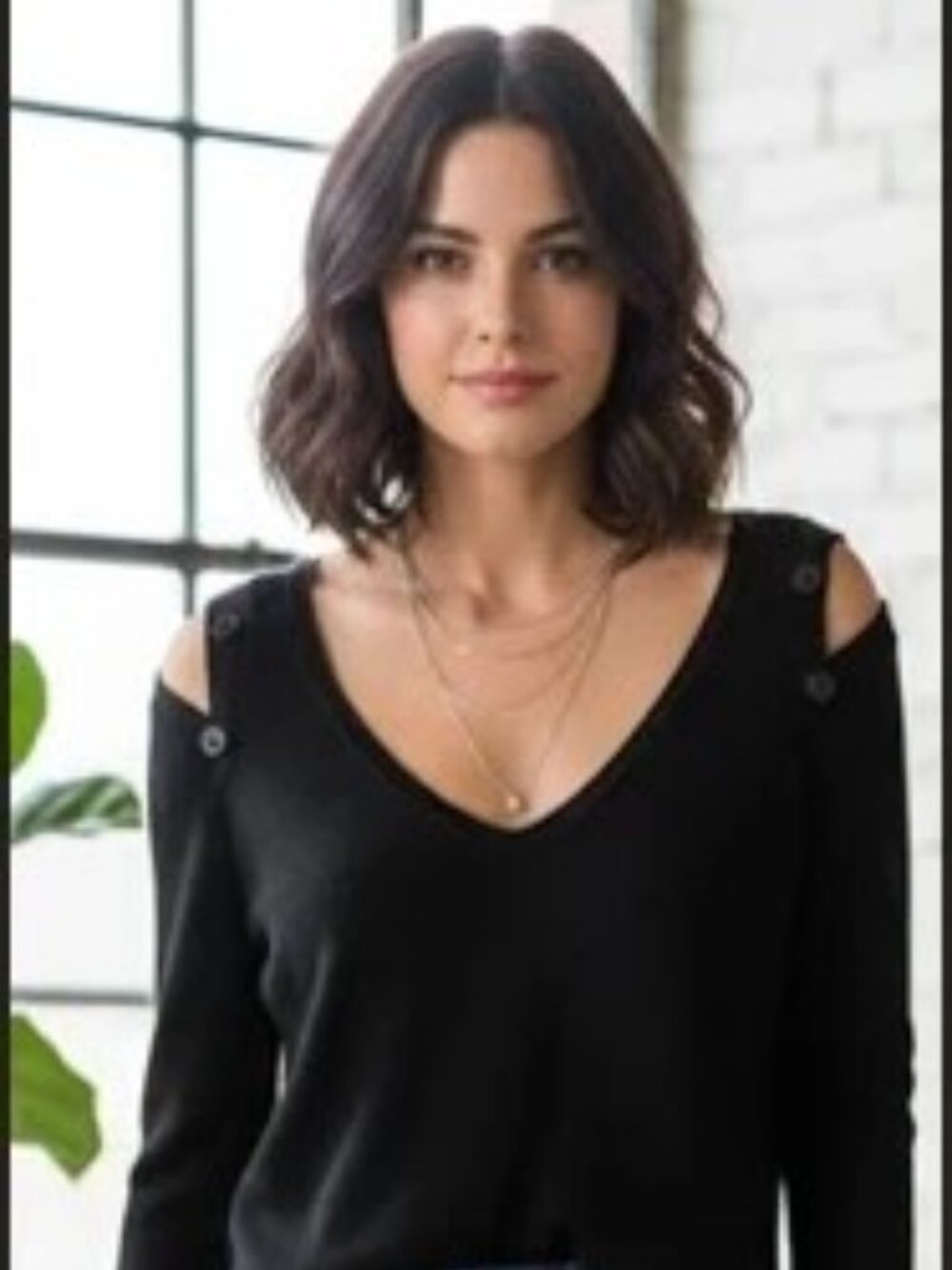 L'agence black top with shoulder details size small